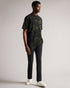 TUGO-Tops-Made from 100% cotton and in a relaxed fit, TUGO perfect for weekend lounging. This quirky camo tee features a relaxed fit, crew neck and short sleeves. Team with jeans and trainers for an easy weekend look.By choosing Ted Baker cotton products, you're supporting our investment in the Better Cotton Initiative's mission. This product is sourced via a system of mass balance and therefore may not contain Better Cotton. T-shirt 100% cotton Relaxed fit Camo jigsaw print Short sleeved Crew neck Grace is